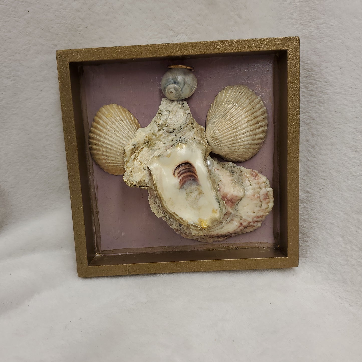 Angel Made of Shells In Frame
